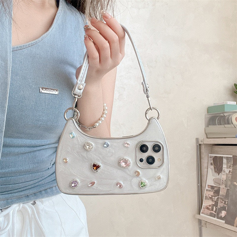๐ฅณ2026 HOT SALE๐ฅณ๐50K+ SOLD!๐ฅโจ๐ 50% OFF! Creative Phone Case with Top Handle โ Synthetic gemstones add luxury shine. Easy carry handle, precise cutouts. Durable TPU protection. Transform your phone into a chic accessory. ๐ฑ๐