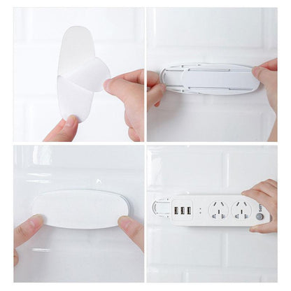 🥳 2026 Best Seller 🥳💞 Over 50,000 units sold! 🔌🪝 50% off! This self-adhesive desktop outlet mount securely holds power outlets, routers, and remote controls—keeping cables neat and organized while ensuring home safety! 🏠✨