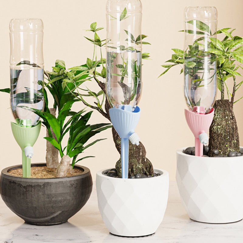 🥳2026 HOT SALE🥳💞50K+ SOLD! 🌴💧 Self-Watering Plant Spike – drip feeds plants for 2+ weeks. Adjustable flow, fits most bottles. Come home to healthy plants! 🏠✨